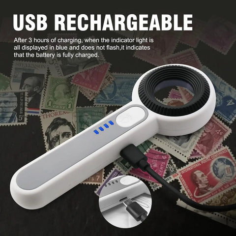 60X Handheld Magnifier With UV And LED Lights Pro Grade Loupe For Gemstones Jewelry Watches And PCB Inspection 30mm Optical Lens Touch Button USB Rechargeable Portable Magnifier On The Go shown with USB cable on a table.