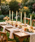 Ivory Flameless Taper Candles With Timer 6 Pack Battery Operated LED Flickering 3D Flame Real Wax Candles on garden table