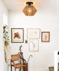Boho Rattan Ceiling Light Fixture with Handwoven Cage Shade Coastal Semi Flush Mount in entryway with framed art