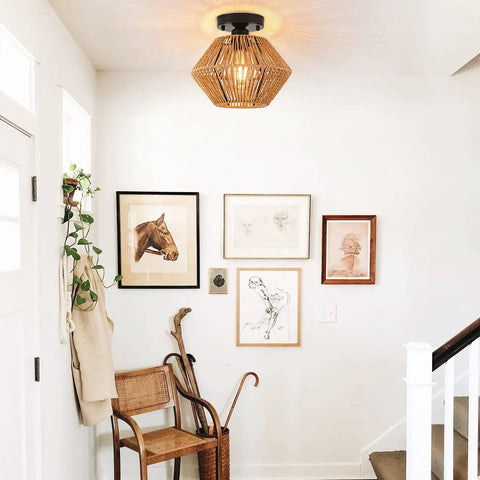 Boho Rattan Ceiling Light Fixture with Handwoven Cage Shade Coastal Semi Flush Mount in entryway with framed art