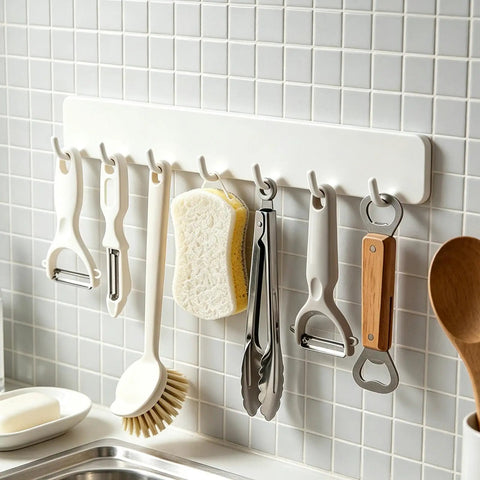 Premium Heavy Duty Self Adhesive Coat Rack Wall Mount Featuring Seven Robust Hooks, organized kitchen utensils on wall.