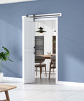 Installed DIY Ready Space Saving Bi-Fold Barn Door Kit With Sliding Hardware, Waterproof PVC Surface, White H-Frame, in dining room.