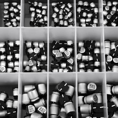 400Pcs SMD Aluminum Electrolytic Capacitor Kit With 24 Values From 1uF To 1000uF 6.3V To 50V Includes Storage Box compartments filled