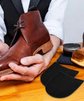 Self Adhesive Non Slip Rubber Heel Pads For Shoes And Boots That Repair Soles with brown leather shoe being polished