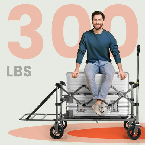 Tailgate Design Heavy Duty Collapsible Wagon With All Terrain Wheels For Outdoor Camping Beach And Garden A 300 Lb Capacity Utility Cart For Sports Groceries Tents And Bulk Gear with person sitting on it