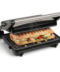 Alpha Living Electric Griddle Panini Press With Non Stick Coating, stainless steel 3 In 1 sandwich maker grilling a pressed sandwich.