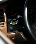 Installed 201-F Lev-O-Gage Inclinometer High Visibility Level Gauge in vehicle dashboard, showing easy-to-read tilt indicator