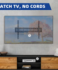 In Wall TV Cable Management Kit For Wall Mounts White Finish installed with hidden cords behind mounted TV on plaster wall.