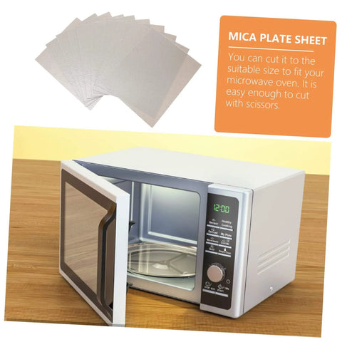 12 Pieces Mica Sheets For Microwave Oven Waveguide Cover with open microwave showing heat-resistant insulation pads for splatter guard.