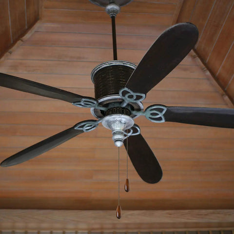 Ceiling fan with Four Piece Walnut Wood Ceiling Fan Chain Pull Extensions, retro royal walnut finish, installed indoors.
