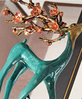 Chinese Motif Ceiling Pendant Light With Modern Fabric Shade And Classic Enamel Design Delivers Straight Up Cozy Ambiance paired with decorative deer figurine in vibrant colors.