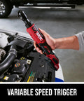 User using Brushless 12V Ratchet Wrench Kit With 2Ah Battery And PWR Jump Charger, Three Eighths Inch Drive in car engine bay