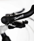 Black Flat Bar Handlebar Extender for Mountain and Hybrid Bikes 22.2mm 7/8 Ends, ergonomic alloy grip with matte finish.
