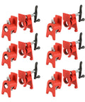 Heavy Duty Cast Iron Pipe Clamps Six Pack Fits One Half Inch Threaded Metal Pipes With Wide Stable Base Grips Like Crazy For Wood Gluing And Garage Workshop Jobs, showing red clamps from various angles.