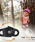 Child ziplining with a Lightweight Aluminum Pulley 20kN 8 To 12mm Single Swing Rigging Pulley For Arborist on a tree in backyard.