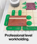 Matchfit Workholding Clamp Kit And Dovetail Router Bit Bundle With One Quarter Inch Shank displayed on a CNC workbench