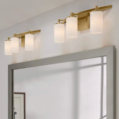 Alturas Three Light Vanity Fixture For Wall And Bath In Satin Brass Sleek 22 Inch Wide 9.1 Inch Tall Steel Construction above mirror