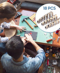Overhead view of two people crafting leather on a table with 18Pcs Universal DIY Embossing Punch Set Kit In Alloy Steel for Leather Crafting shown.