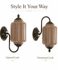RONGHUAFUGUI Vintage Modern Wall Sconce with Amber Glass shown in upward and downward orientations, featuring antique brass finish and ribbed amber glass.