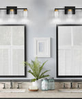 Dope Gold And Black 3 Light Vanity Light With Crystal Bubble Glass above double sinks in modern bathroom