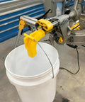 Keep Your Workshop Clean With This Dust Collector Kit For Miter Saw DWS780 No Vacuum Needed Attachment System That Uses A 5 Gallon Bucket Easy Install Mess Free Durable Yellow Sawdust Solution attached to miter saw