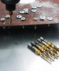 Drill tapping a metal surface with Six Pack Titanium Drill Tap Bit Set With All In One Drill Tap And Countersink For Metalworking Built To Last Titanium Nitride Coating For Extra Hardness And Longer Life SAE Sizes 6-32NC 8-32NC 10-24NC 10-32NC 12-24NC 1/4-20NC displayed below