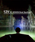 Boat on a lake using TacticPro 2000 Lumen HID Spotlight Floodlight For Auto, Garage, Boating, Fishing, Hunting, Camping, Hiking, Emergency And Patrolling Your Go To Handheld Spotlight With Durable ABS Build And Rugged Rubber Grip illuminating trees