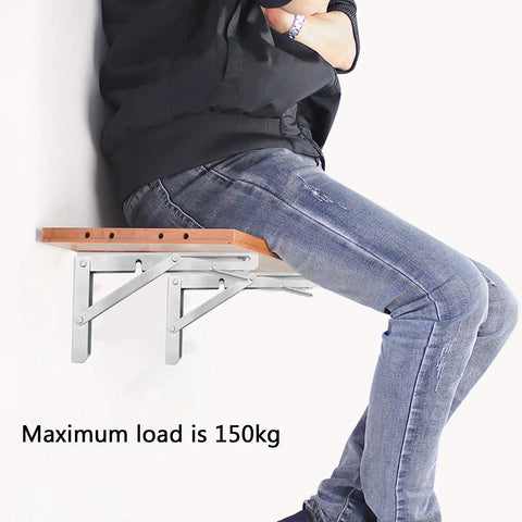 Heavy Hitting Foldable Wall Mount Shelf Brackets One Pair Stainless Steel L Shaped Corner Brace Saves Space And Handles Weight Like A Champ Built Tough For Kitchens And Bathrooms Always Reliable with a person sitting on it.