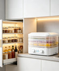Sleek Digital Food Dehydrator With Adjustable Temperature And Timer For Fruits Veggies Meat Heavy Duty Electric Dryer on kitchen counter.