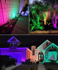 Outdoor 24W RGB Landscape Lights With Transformer And Remote, lighting up garden, trees, and home exterior with colors.