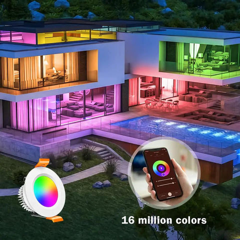 Smart home exterior illuminated with 2 Inch Smart LED Recessed Light Kit With 5W RGB Color Changing And CCT 2700K To 6500K, smartphone control