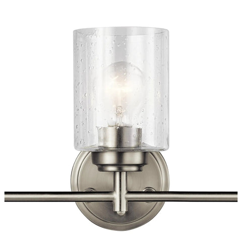 Close-up of Three Light Vanity Light In Brushed Nickel With Clear Seeded Glass, Modern Transitional Bath Fixture For Above The Mirror