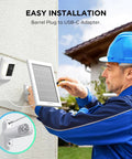 Worker installing 2 Pack Solar Panel Charger For Battery Cameras, IP68 Waterproof, 13ft Cable With USB-C Adapter on wall