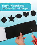 Person cutting Heavy Duty Hook And Loop Tape Adhesive Roll 4.4 Inch By 16.5 Foot Black Velcro Strips into shapes for wall mount use