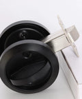 Sleek Stainless Steel Low Profile Door Knobs With Butter Smooth Nonlocking Flat Handle And Hidden Recessed Cup Shape Fast Mount Pocket Entry Handle Set Includes Black Chicago Screws For Rock Solid Grip, shown from above.