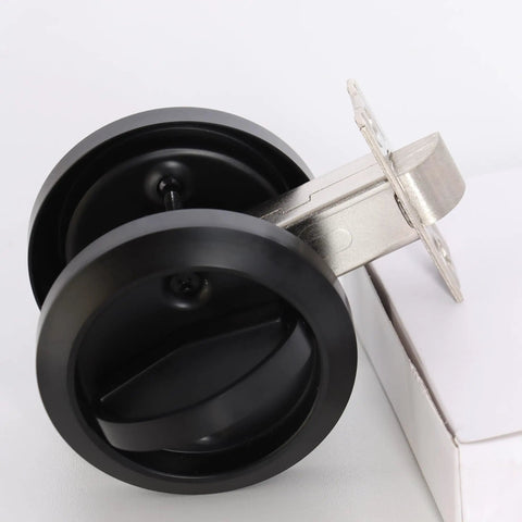 Sleek Stainless Steel Low Profile Door Knobs With Butter Smooth Nonlocking Flat Handle And Hidden Recessed Cup Shape Fast Mount Pocket Entry Handle Set Includes Black Chicago Screws For Rock Solid Grip, shown from above.