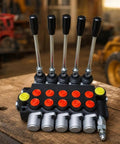 Heavy Duty Manual Hydraulic Directional Control Valve Block Featuring A Rock Solid Cast Iron Housing And Comfortable Lever Actuator For Tractor And Workshop Equipment That Handles Flow Like A Champ Built For The Long Haul on a wooden table.