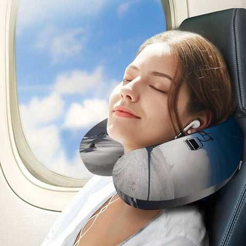 Woman using Sunshine U Shape Travel Pillow For Long Haul Flights And Office Naps, ergonomic neck support in airplane seat.