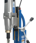 Kicking Heavy Duty Two Speed Magnetic Drill With Pressurized Coolant Setup And 115 Volt Badass High Torque Motor For Stacked Steel Plates, showing motor and drill.