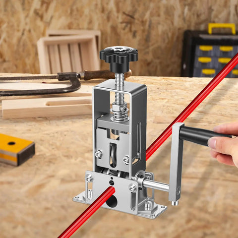 Heavy Duty Drill Powered Wire Stripper Machine For Copper Scrap Recycling And Electrical Work With Hand Crank Backup, close-up of stripping action on red cable.