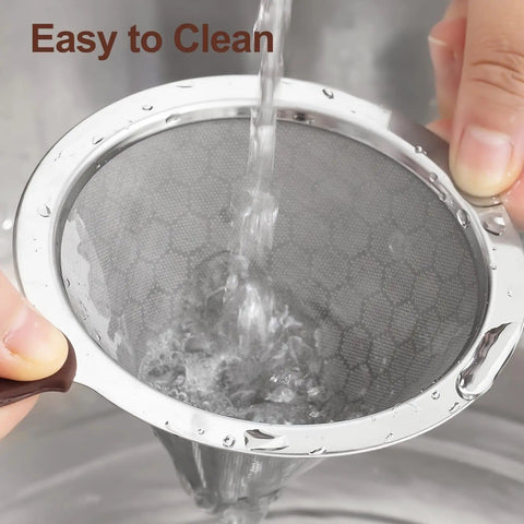 Pour Over Coffee Dripper With Stainless Steel Filter Reusable Paperless Cone Dripper With Removable Cup Easy To Clean Double Layer 800 Mesh Pro Grade Brew Accessory For Rich Flavor At Home. Stainless steel filter being rinsed under water, demonstrating easy cleaning.