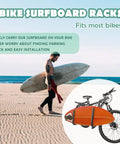 Bike Surfboard Rack With Quick Release Bars Adjustable Up Down And Rotatable Angles For A Comfortable Ride Fits Longboards Shortboards And SUP Up To 30 Lbs Durable Bike Mount For Outdoor Surfing And Wakeboard Carrier shown with bike on beach