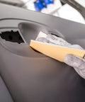 Person using Soft Hand Sanding Sheets 4.5 By 5 Inch Grit 240 On Perforated Roll 200 Sheets A Weight Latex Backing for sanding car door