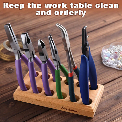 Wood Pliers Block Organizer for the Bench fits 6 pairs in a 12 hole rack with pliers on wooden table