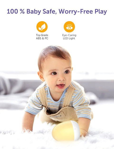 Baby playing with Kid Friendly Portable Egg Night Light With Stable Charging Pad Touch Control Nursery Lamp For Breastfeeding And Toddler Sleep Gentle Bedroom Glow 1 Hour Timer ABS And PC White