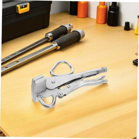 Heavy Duty Pulling Pliers Clamp For Auto Body Sheet Metal Repair on a workbench, showcasing steel construction and locking mechanism.