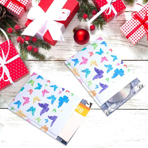 Festive scene with Colorful Butterfly Bubble Mailers 6x10 Inch 25 Pack Poly Padded Envelopes used for shipping gifts and items