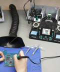 2 In 1 Digital Soldering Iron Kit With Precision Soldering Station Dual C210 And C245 Tips Auto Calibration Adaptive Display Pro Grade PID Temperature Control Rapid Heating For DIY Electronics And Pro Projects in use on circuit board