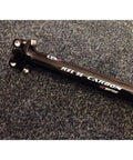 Ultra Lightweight 3K Matte Carbon Fiber Seatpost Built For Mountain Bikes Downhill MTB 27.2x350mm shown on carpet
