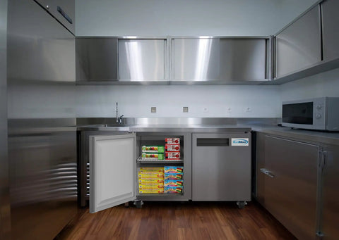 Built Tough 48 Inch Stainless Steel Commercial Worktop Freezer With Dual Doors in modern kitchen setting and open door.